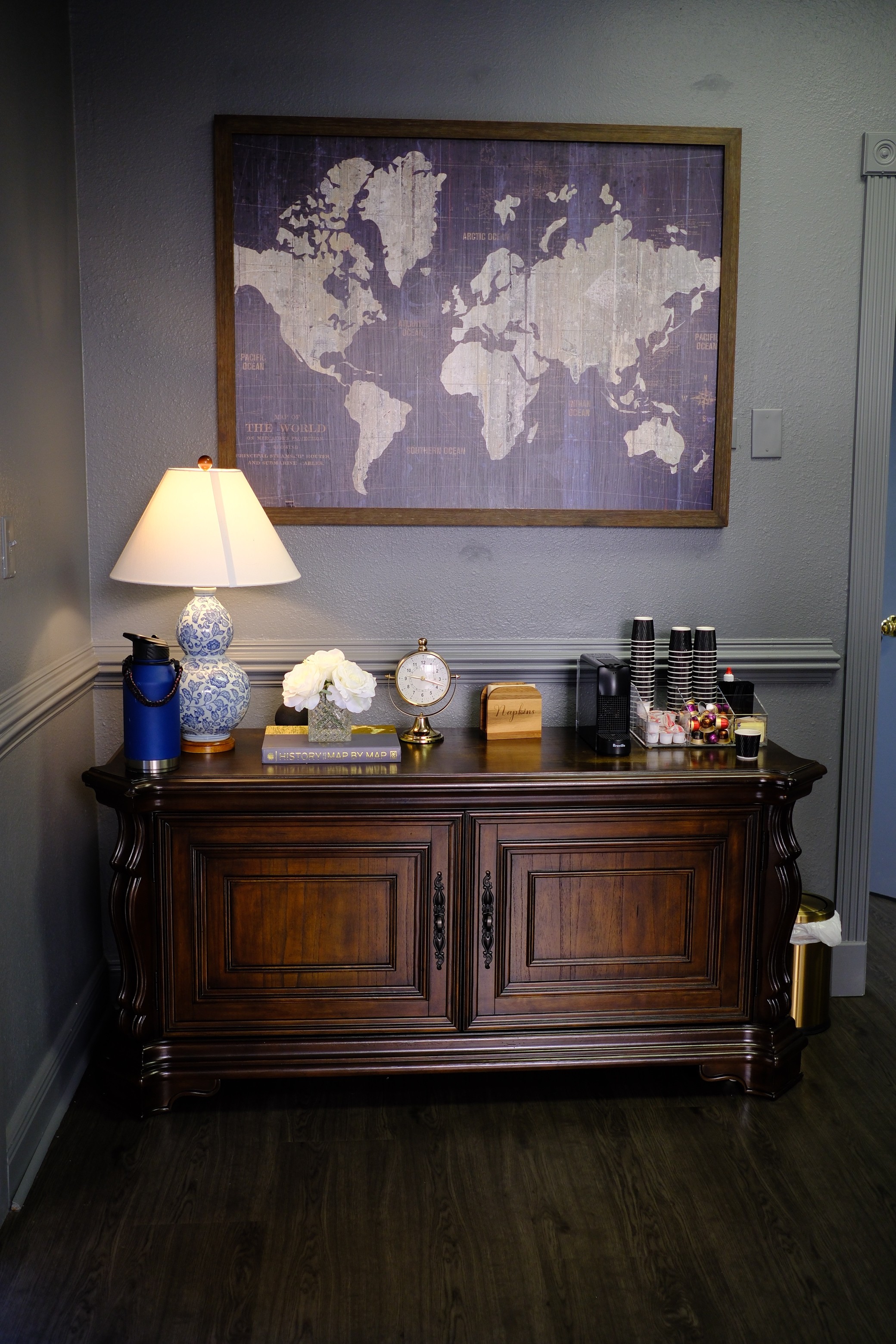 Photo of a study hall with wooden tables and chairs.